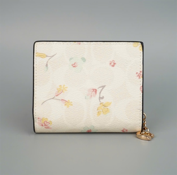 Ví Coach gập 2 trắng in họa tiết +