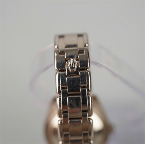 Đồng hồ Rolex (917491Y4) vàng khối, mặt Saphire xanh viền 2 thẻ kèm giấy kiểm định KG+