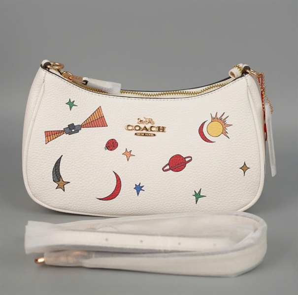 Túi Coach trắng họa tiết sz23 +