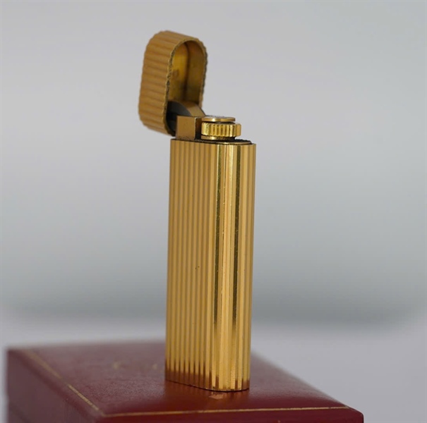Bật lửa Cartier vàng (7447793) KG+