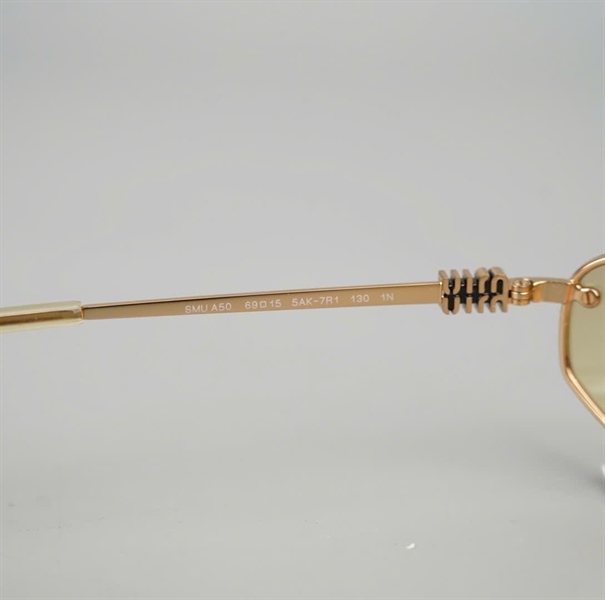 Kính Miu Miu SMUA50 1BC-70J (69-15-130) KG+