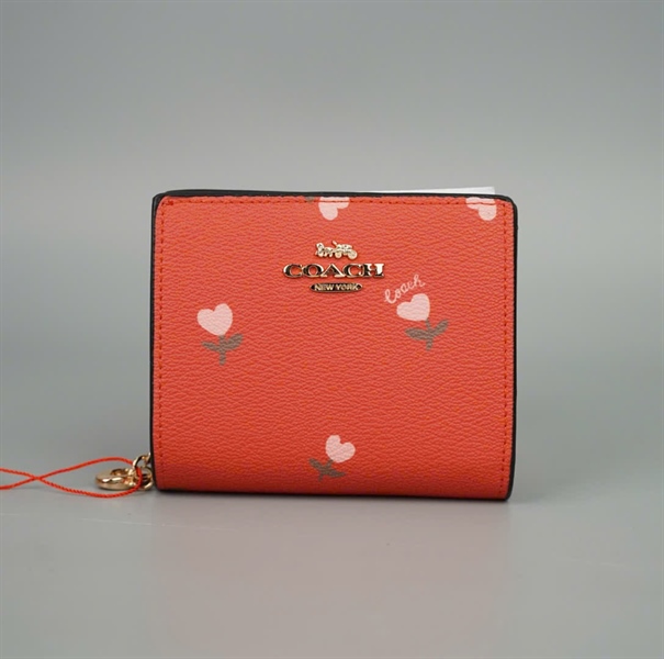 Ví Coach cam in hình cây trái tim +