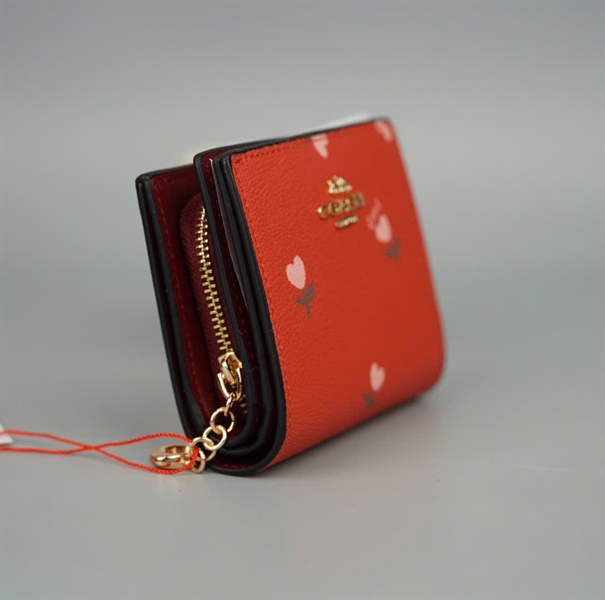 Ví Coach cam in hình cây trái tim +