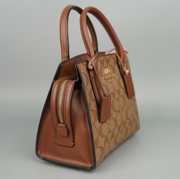 Túi Coach handle nâu sz21 +