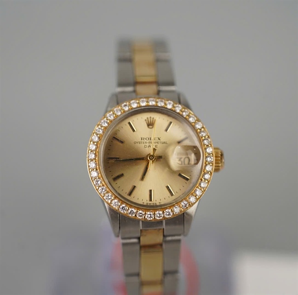 Đồng hồ Rolex tròn đinh đá KG+