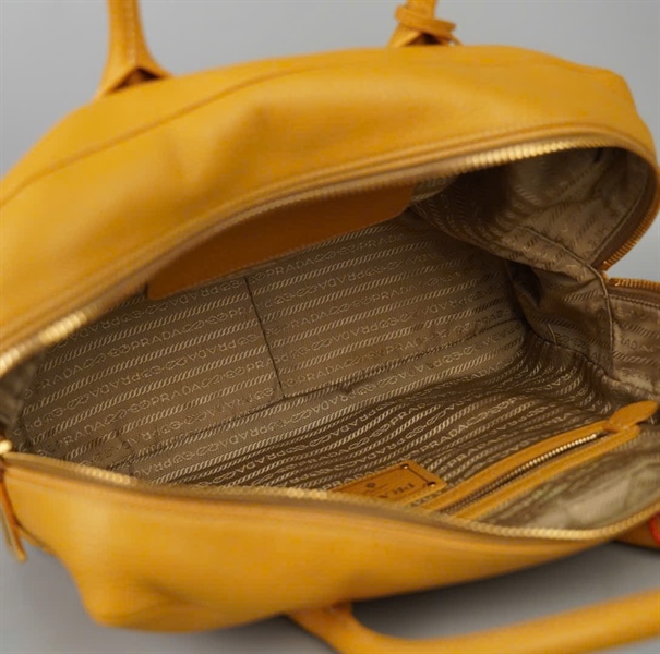 Túi Prada Handle vàng kèm ổ+ 2 chìa sz33 KG+