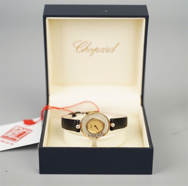 Đồng hồ Chopard mặt tròn dây đen (327637) KG+