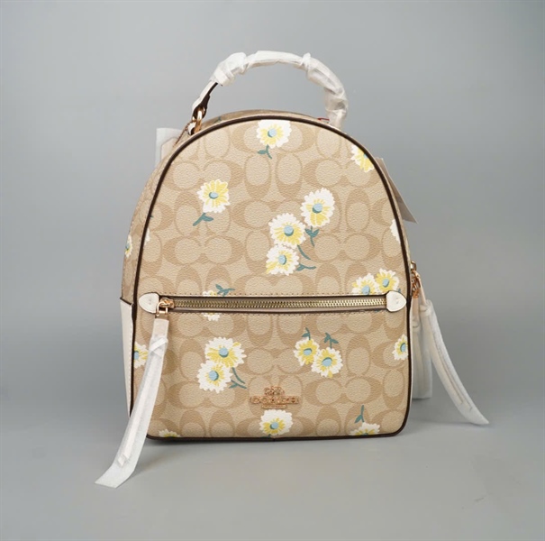 Balo Coach nude hoa cúc +