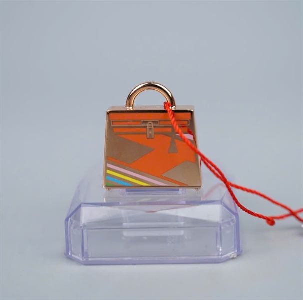 Charm Hermes vàng KG+