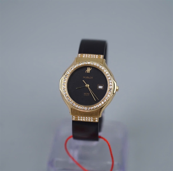 Đồng hồ Hublot vàng khối kc zin mặt tròn dây đen KG+