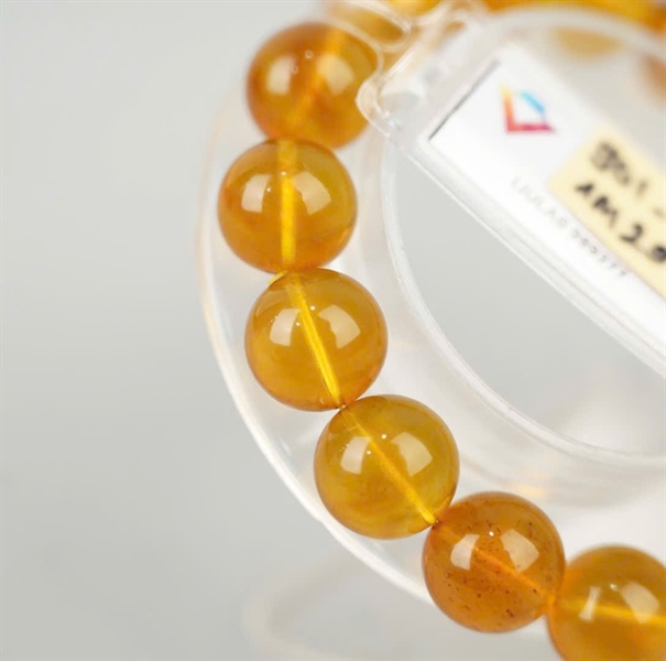 Dây vòng hổ phách 989277 thiếu sổ KG+