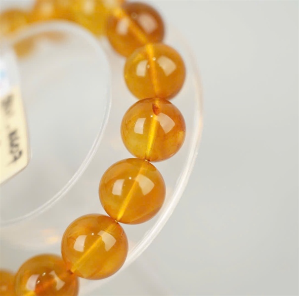 Dây vòng hổ phách 989277 thiếu sổ KG+