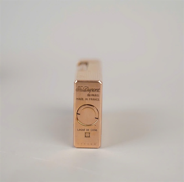 Bật lửa S.T Dupont vàng đen hình cò (Z7GD46) KG+