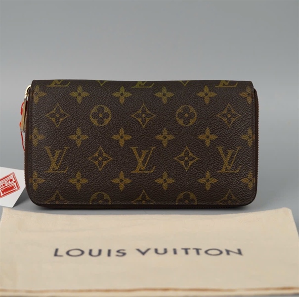 Ví LV hoa nâu khóa zip KG+