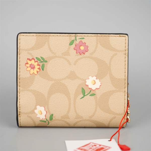 Ví Coach nude hoa nhí +