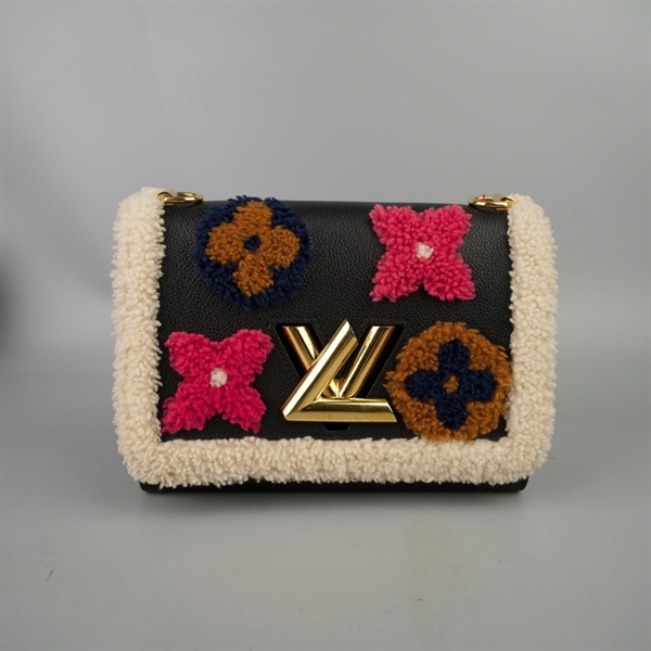 Túi LV Twist đen đính hoa (SR4270) sz23 (BMC)+