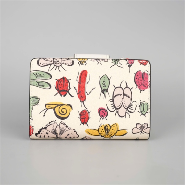 Ví Coach trắng hình bướm gập 2 +