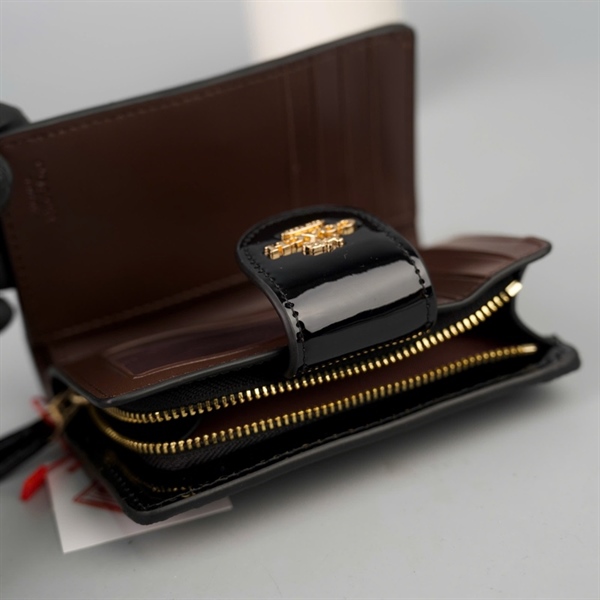 Ví Coach đen dập nổi +