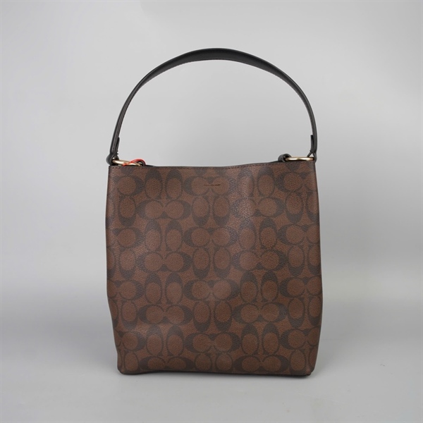 Túi Coach Bucket nâu in chữ sz24+