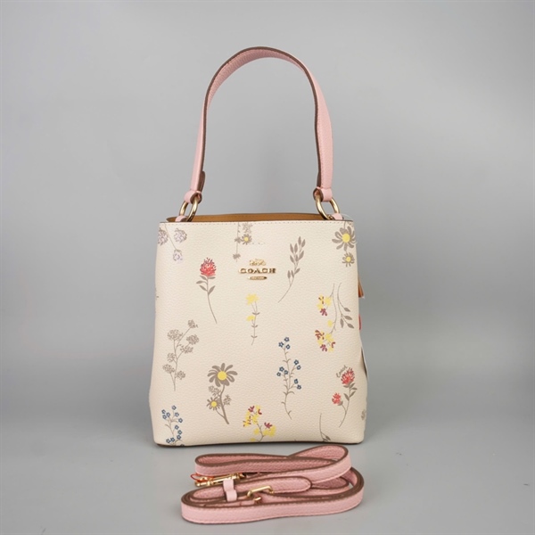 Túi Coach Bucket trắng in hoa sz20 +