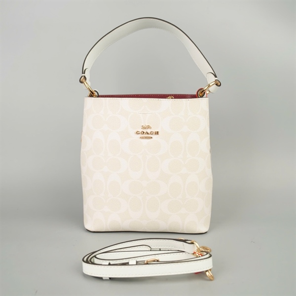 Túi Coach Bucket trắng in chữ sz20 +