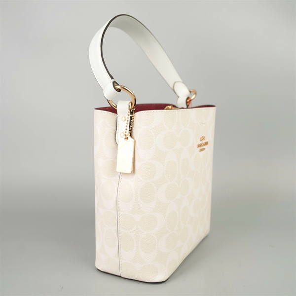 Túi Coach Bucket trắng in chữ sz20 +