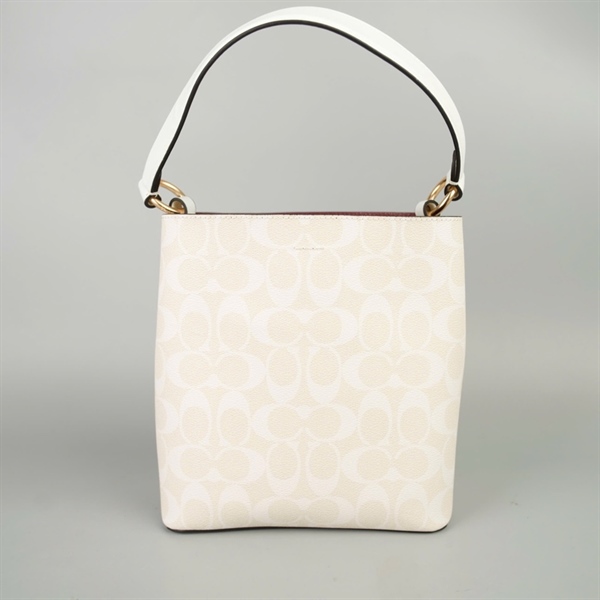 Túi Coach Bucket trắng in chữ sz20 +