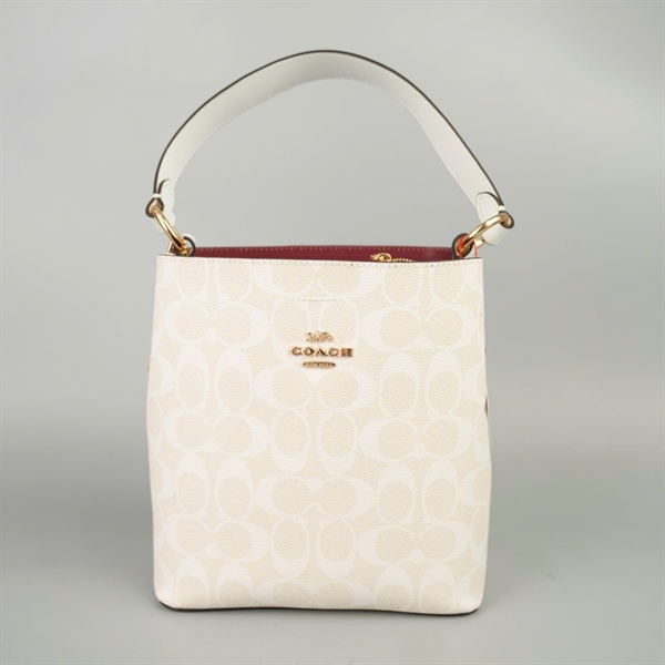 Túi Coach Bucket trắng in chữ sz20 +