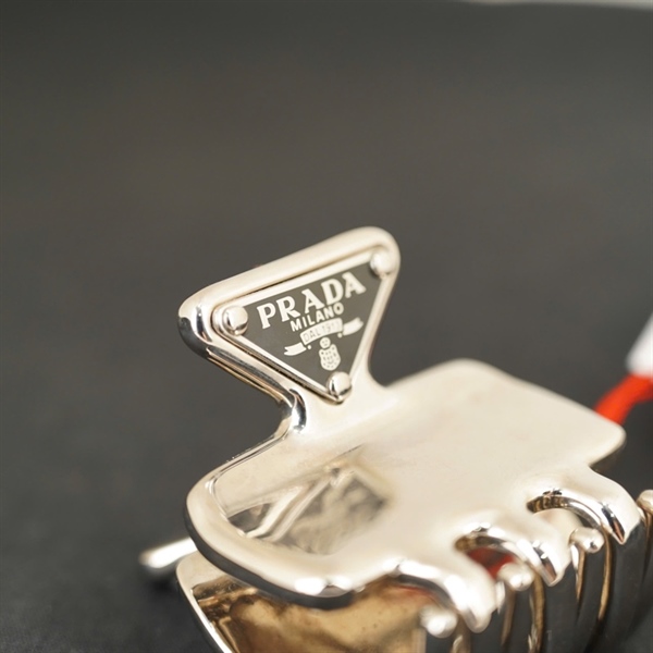 Kẹp tóc Prada bạc KG+