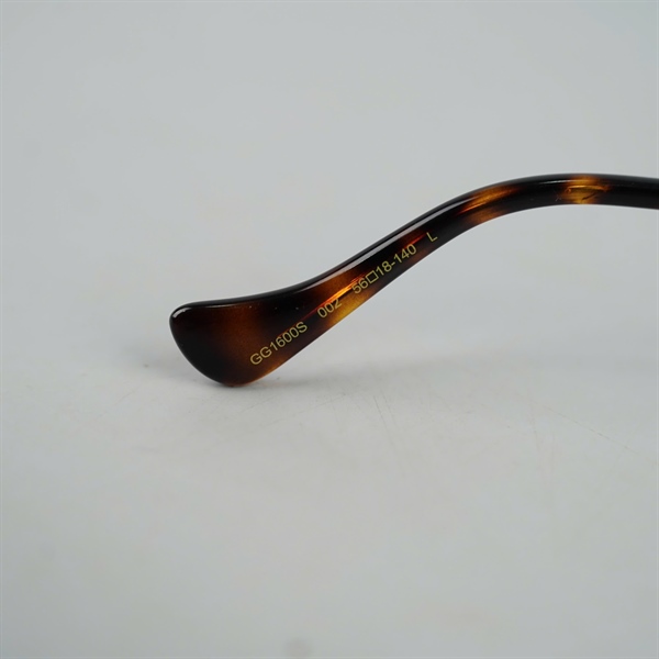 Kính GG nâu GG1600S 002 (56-18-140) kèm dây đeo (HC) KG+