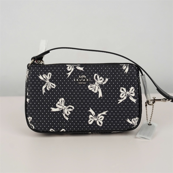 Túi Coach kẹp nách đen nơ sz19 +