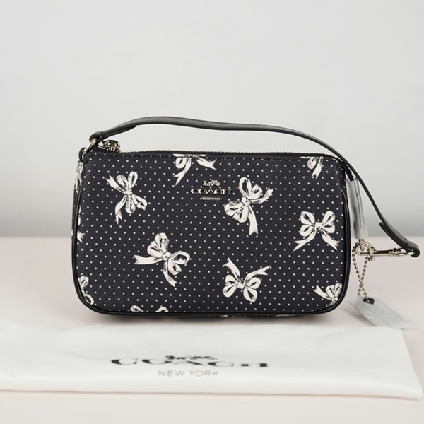 Túi Coach kẹp nách đen nơ sz19 +