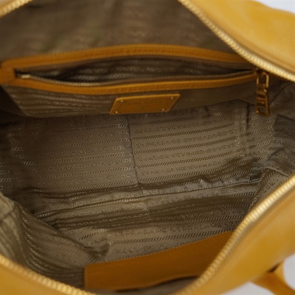 Túi Prada Handle vàng kèm ổ+ 2 chìa sz34 KG+