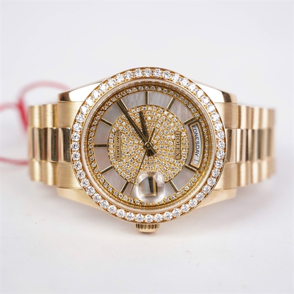 Đồng hồ Rolex vàng viền đính đá mặt độ- vành kim độ sz38 (HC) KG+