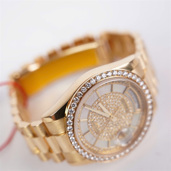 Đồng hồ Rolex vàng viền đính đá mặt độ- vành kim độ sz38 (HC) KG+