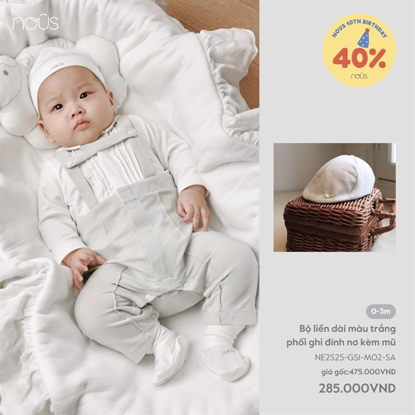 Bộ liền dài màu trắng phối ghi đính nơ kèm mũ