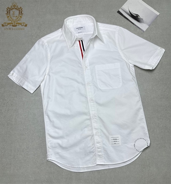 Sơ mi Thome Browne cộc tay trắng túi ngực