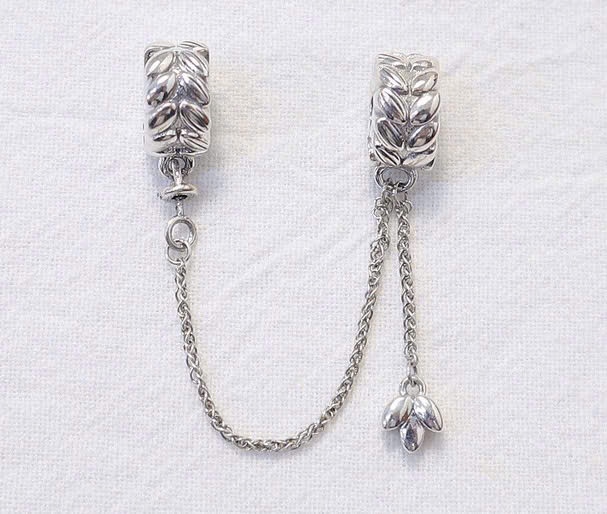 Charm xích Safety bạc +