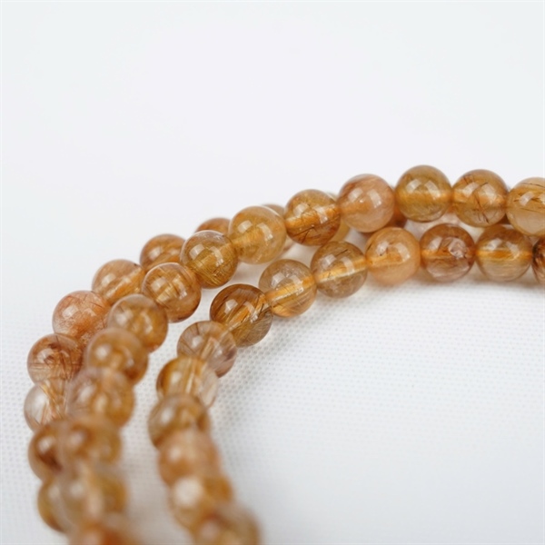 Chuỗi tóc nâu 108hạt 673896 kt 6.97-6.52ly KG+