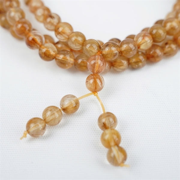 Chuỗi tóc nâu 108hạt 673896 kt 6.97-6.52ly KG+