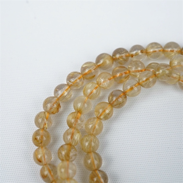 Chuỗi tóc vàng 114hạt 479377 kt 7.98-4.26ly KG+