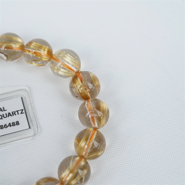 Vòng tay tóc vàng 18hạt 286488 kt 11.87-11.37ly KG+