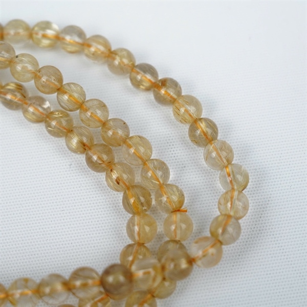 Chuỗi tóc vàng 114hạt 479377 kt 7.98-4.26ly KG+