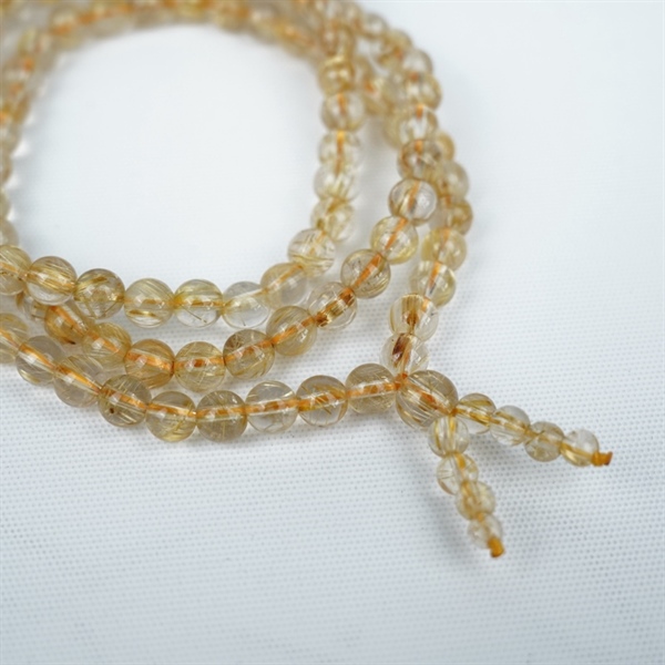 Chuỗi tóc vàng 117hạt 429479 kt7.20-3.83ly KG+