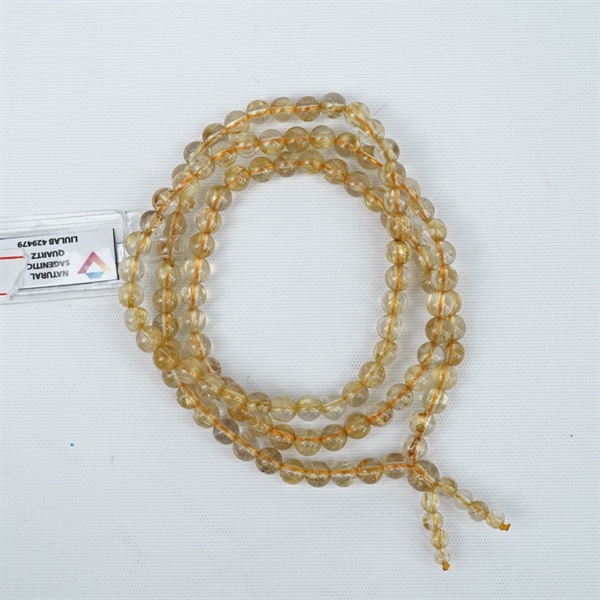 Chuỗi tóc vàng 117hạt 429479 kt7.20-3.83ly KG+