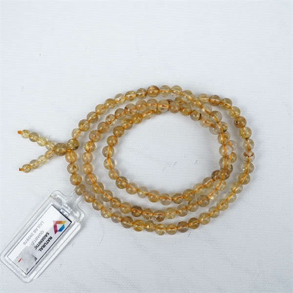 Chuỗi tóc vàng 118hạt 295976 kt6.53-4.39ly KG+