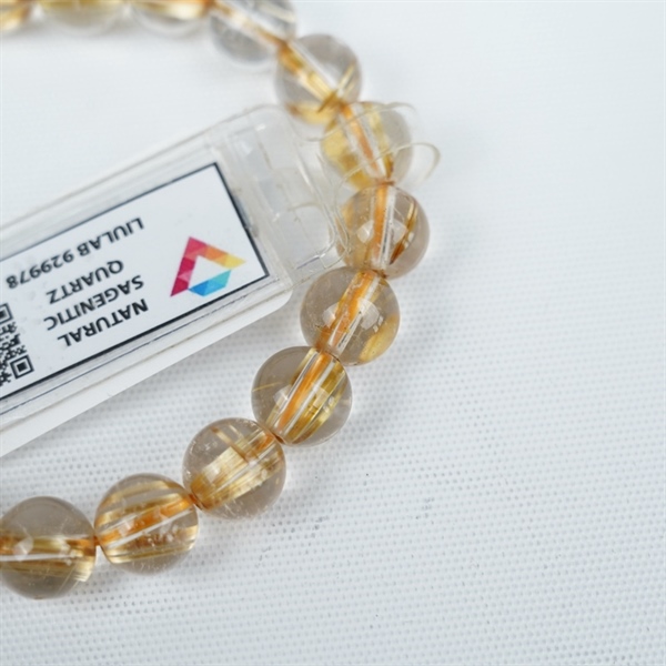 Vòng tay tóc vàng 21hạt 929978 kt 9.45-9.01ly KG+