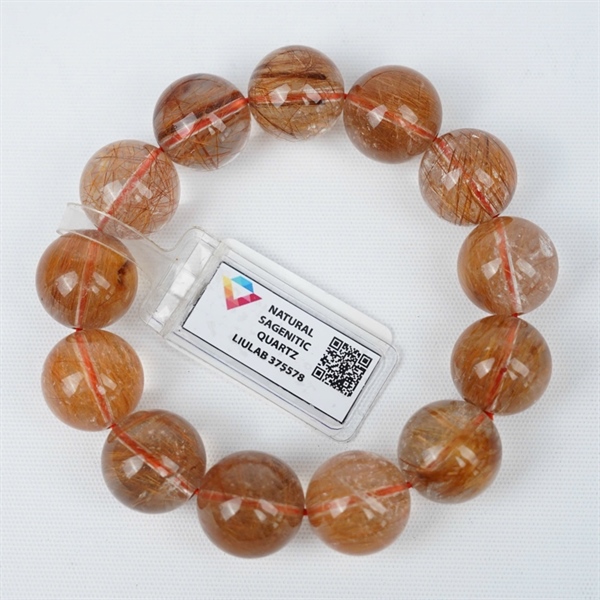 Vòng tay tóc nâu 13hạt 375578 kt 17.93-16.96ly KG+