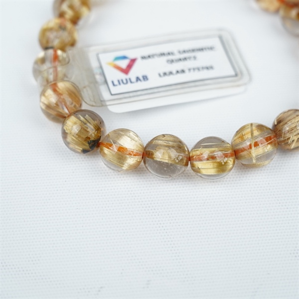 Vòng tay tóc vàng 20hạt 775765 kt 10.48-10.02ly KG+