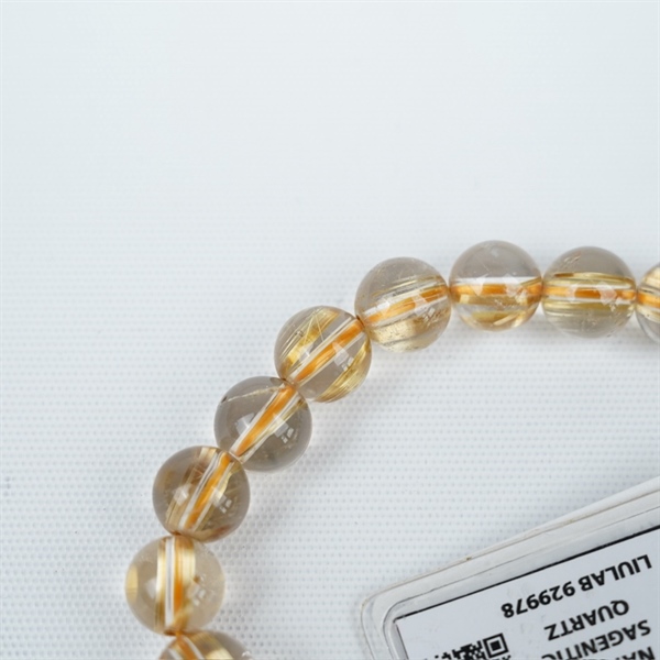 Vòng tay tóc vàng 21hạt 929978 kt 9.45-9.01ly KG+